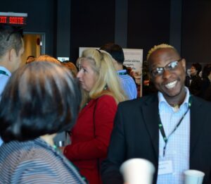 conference attendees networking or sharing a conversation